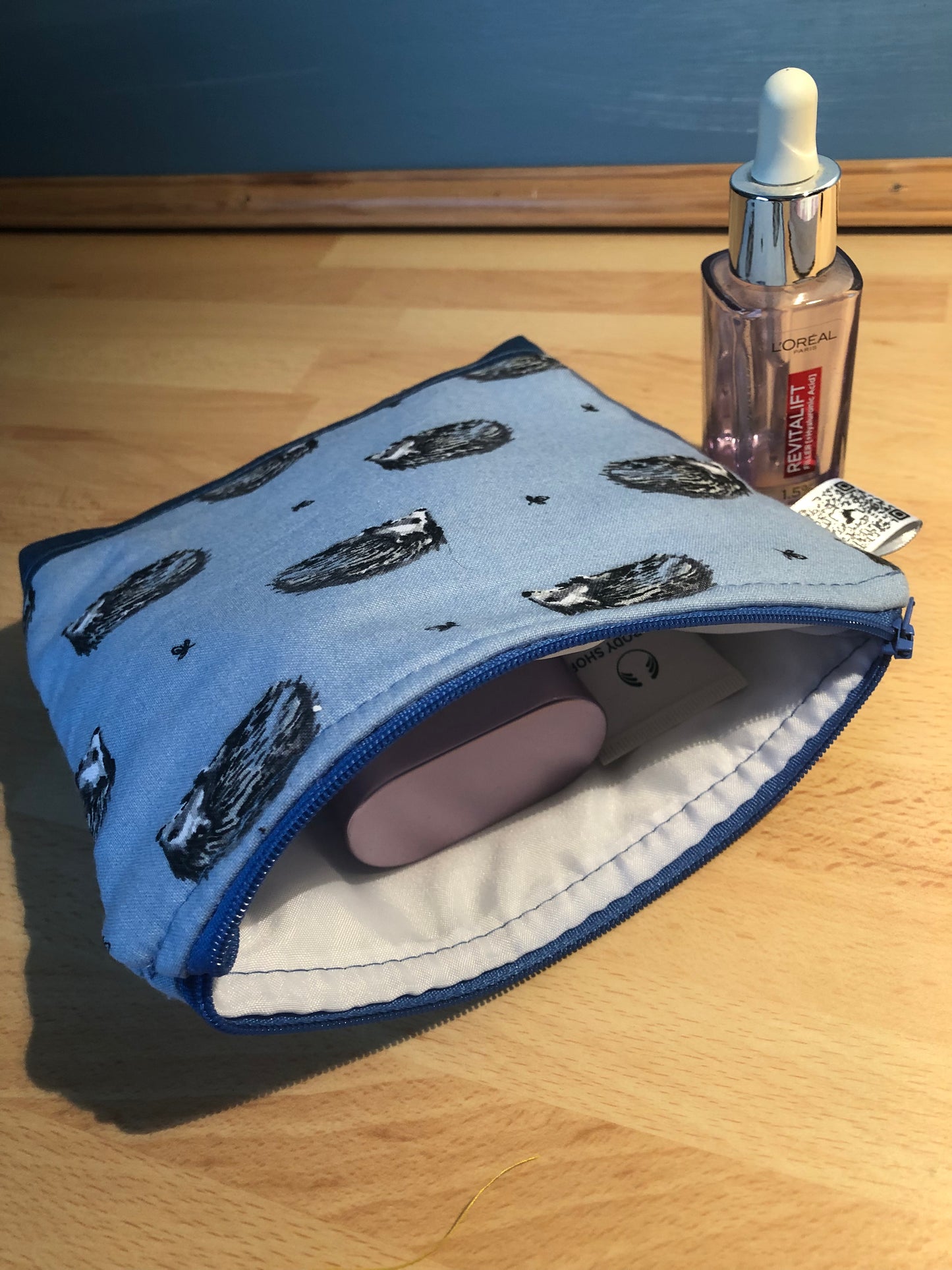 blue hedgehog cosmetic bag with blue zip and waterproof lining