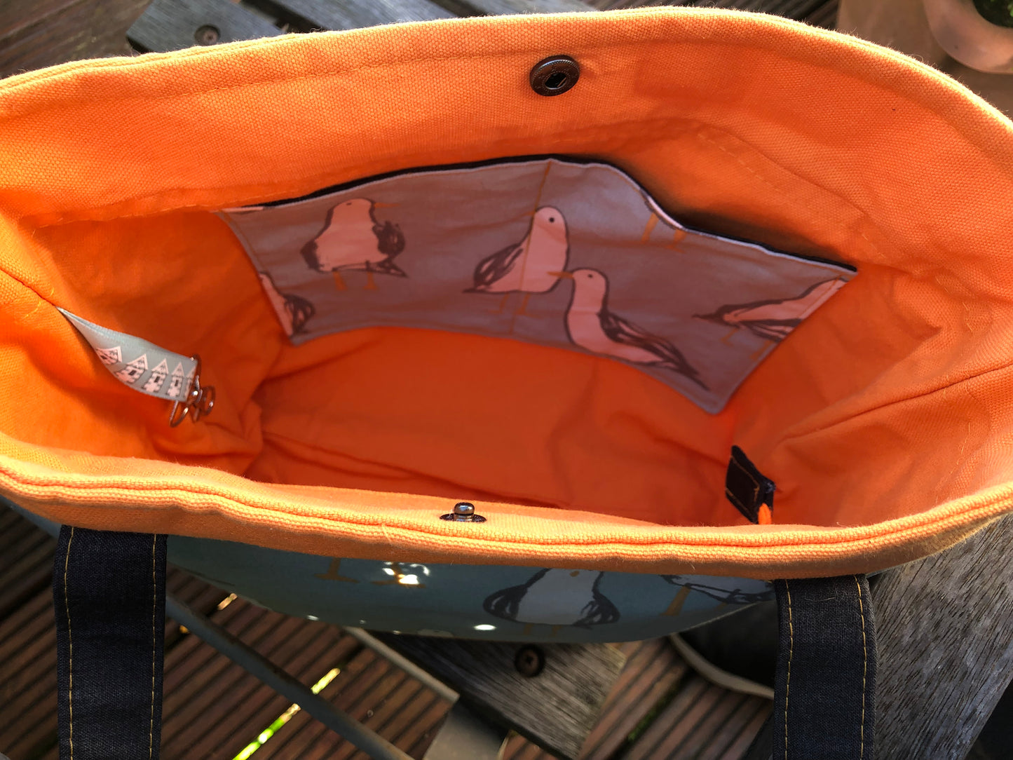 orange, blue, grey and white seagull patterned, luxury padded shopper/office bag