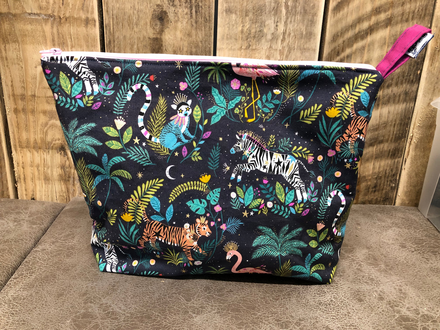 Magical jungle wash bag with waterproof linings and pockets