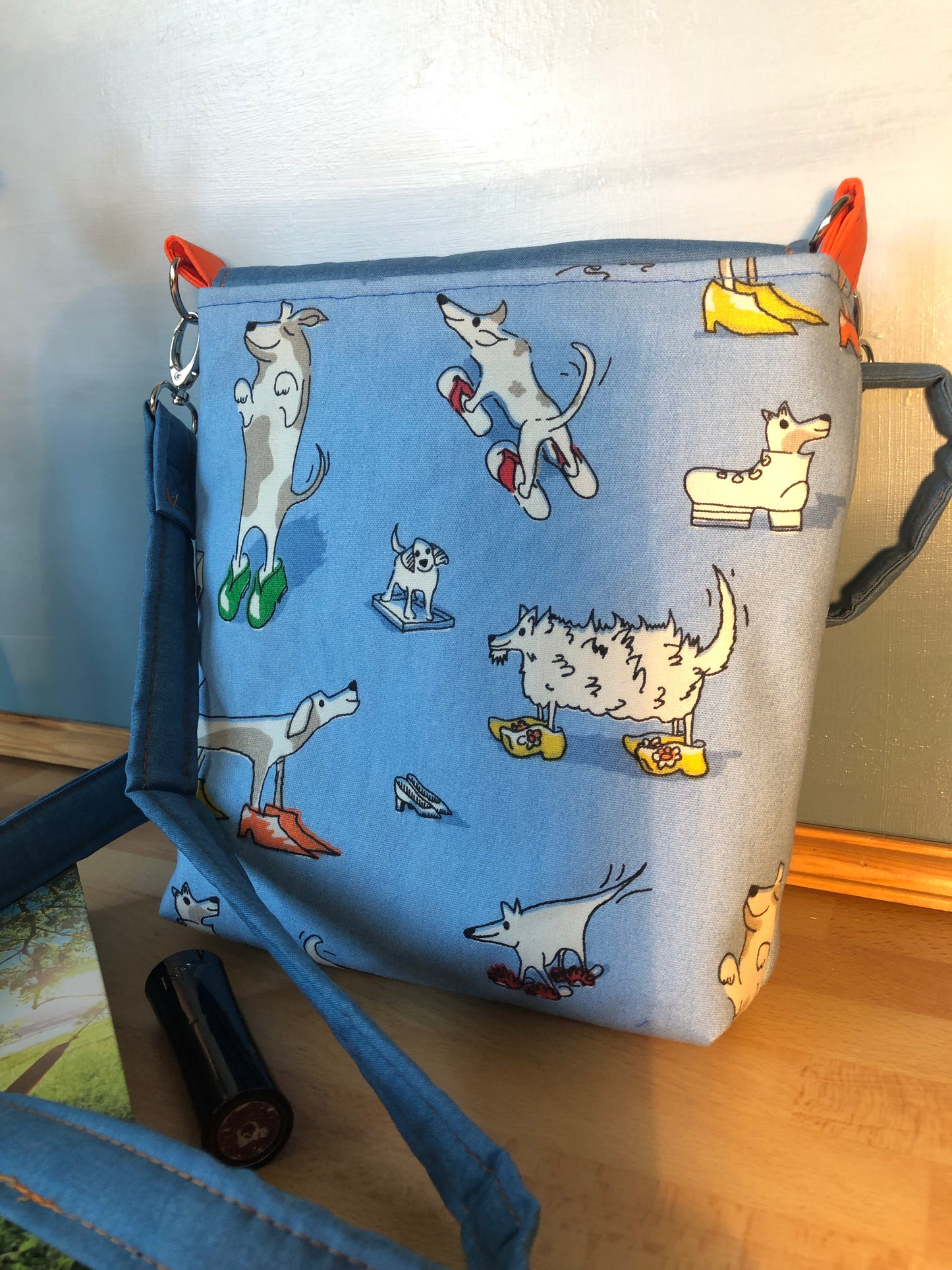 dogs in shoes, cross body bag with adjustable strap and internal pockets