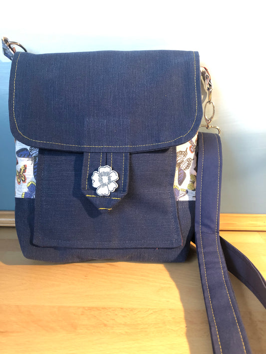 Blue butterfly cross body bag with detachable strap