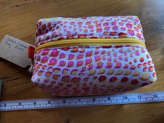 orange, yellow and red, snail pattern cosmetic bag