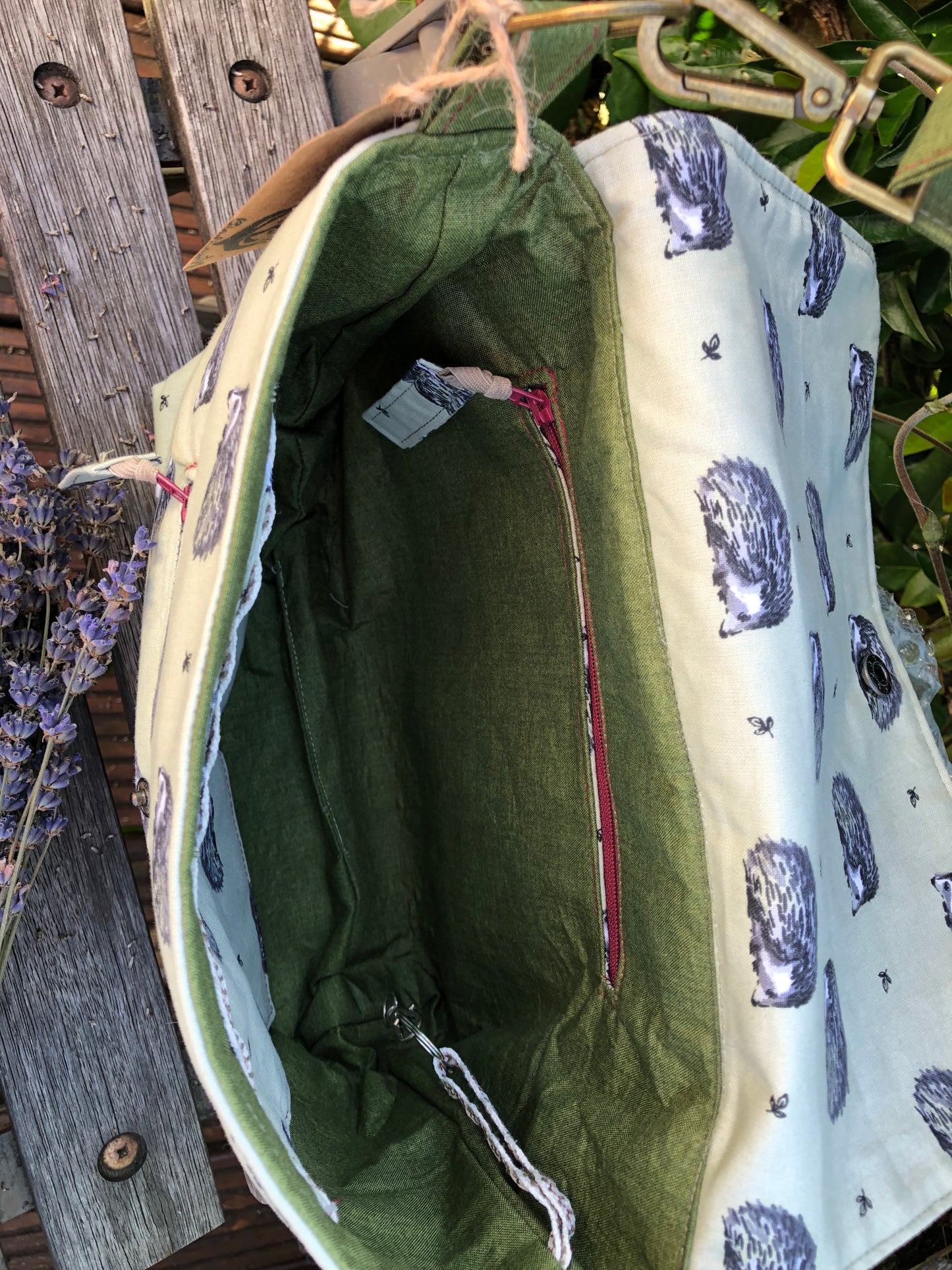 Green hedgehog shoulder bag with adjustable length strap