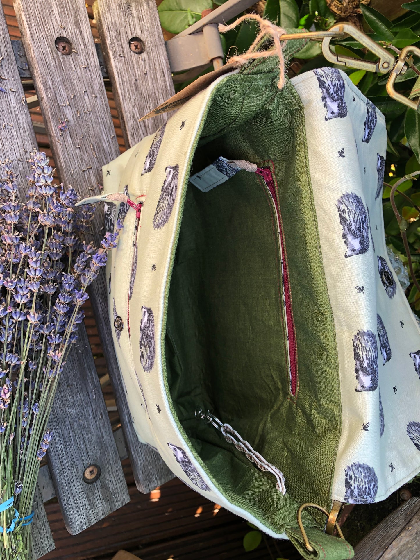 Green hedgehog shoulder bag with adjustable length strap