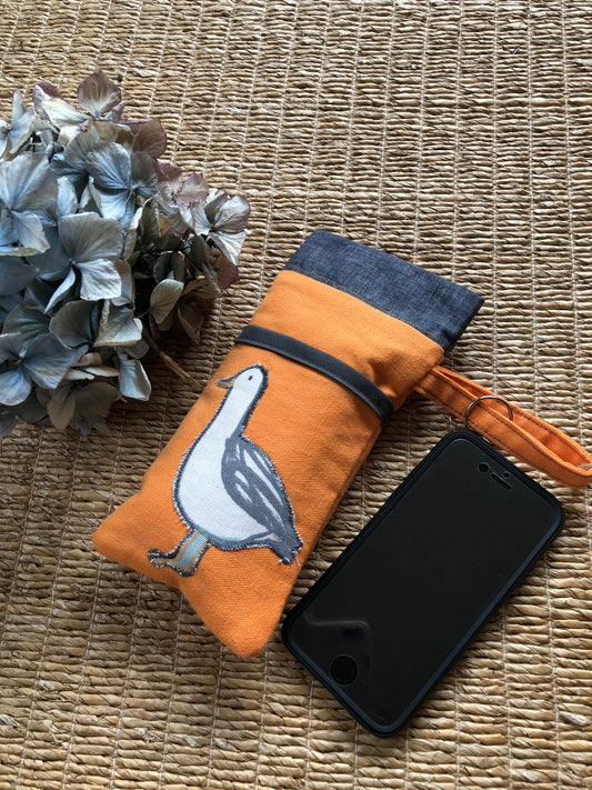 orange and charcoal seagull phone bag with wrist strap and carabina fastening