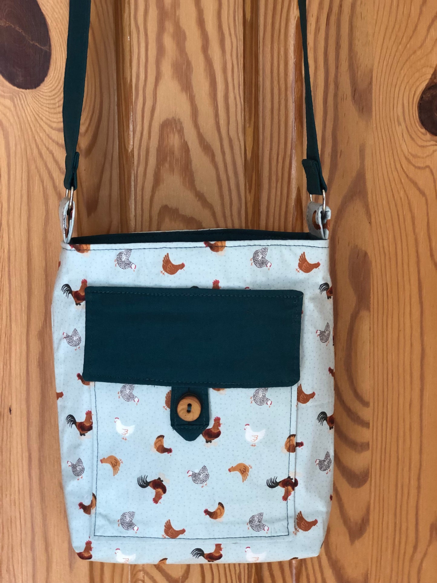 teal chicken cross-body bag